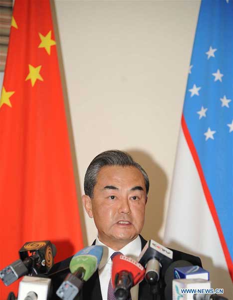 TASHKENT, May 24, 2016 (Xinhua) -- Chinese Foreign Minister Wang Yi addresses reporters after attending a meeting of the Shanghai Cooperation Organization (SCO) foreign ministers in the capital of Uzbekistan on May 24, 2016. The Shanghai Cooperation Organization (SCO) has become a paradigm of global and regional cooperation with great vitality and significant influence since its founding 15 years ago, visiting Chinese Foreign Minister Wang Yi said here Tuesday. (Xinhua/Sadat)