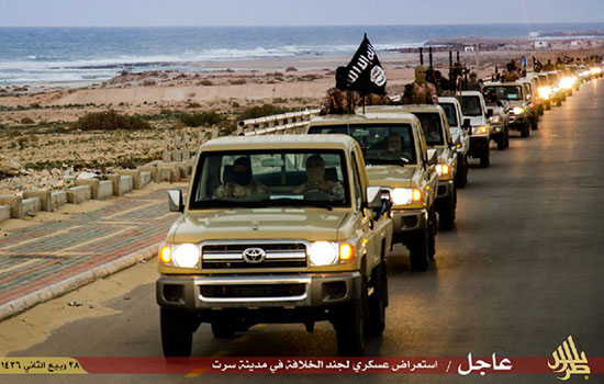 An image from Islamist media outlet Welayat Tarablos allegedly shows members of the Islamic State group parading in a street in Libya