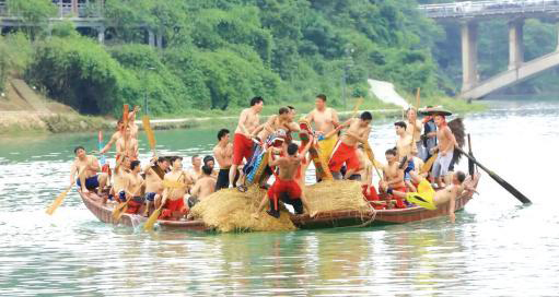 Two dragon boats set off from each side of the river, paddlers racing and chanting to the beat of the drummers. But it