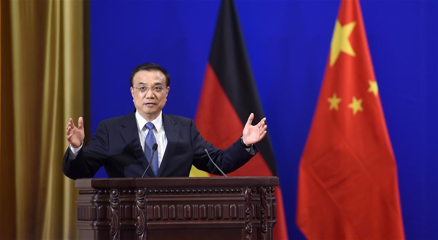  Chinese Premier Li Keqiang addresses the eighth forum on China-Germany economic and technological cooperation in Beijing, capital of China, June 13, 2016. German Chancellor Angela Merkel also attended the forum here on Monday. (Xinhua/Zhang Duo)