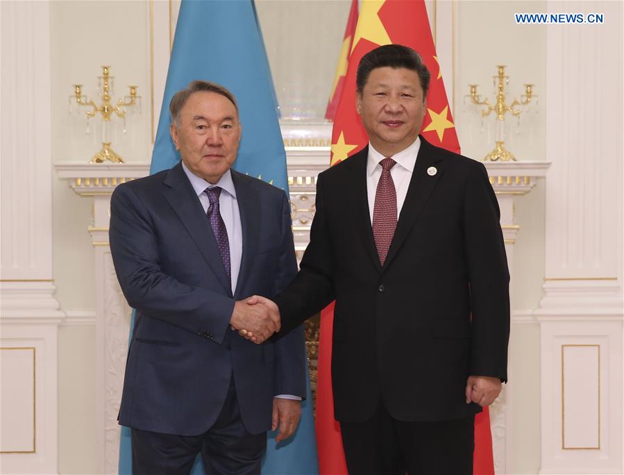 Chinese President Xi Jinping (R) meets with Kazakh President Nursultan Nazarbayev in Tashkent, Uzbekistan, June 24, 2016. 