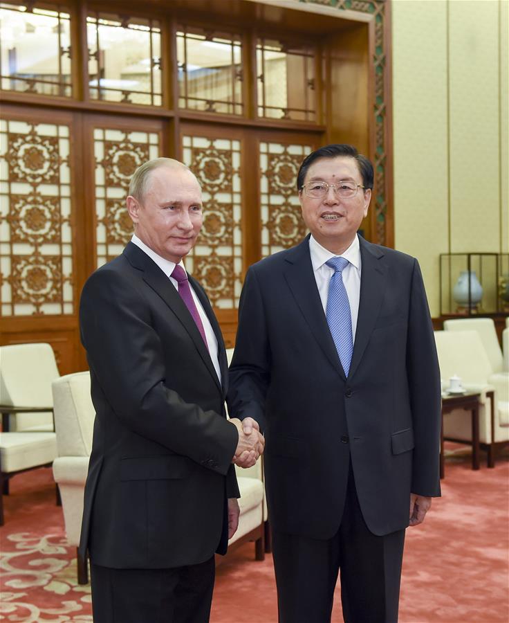 Zhang Dejiang (R), chairman of the Standing Committee of China