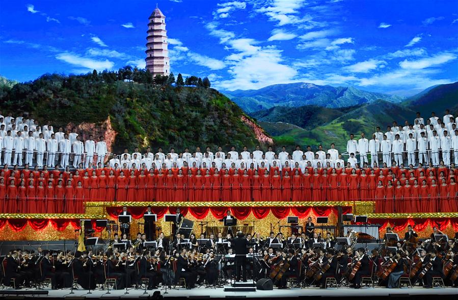 Performers sing at the concert "Eternal Faith" marking the 95th anniversary of the founding of the Communist Party of China (CPC) at the Great Hall of the People in Beijing, capital of China, June 29, 2016. (Xinhua/Wang Ye)