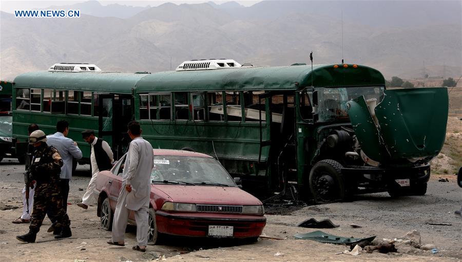 Afghan security force inspect the site of a suicide attack in Kabul, Afghanistan, June 30, 2016. Two suicide explosions hit Afghan police convey of five buses in the western part of Kabul on Thursday, leaving at least 30 people dead, sources said. (Xinhua/Rahmat Alizadah) 