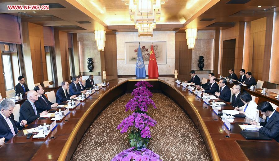 Chinese Foreign Minister Wang Yi holds talks with UN Secretary-General Ban Ki-moon in Beijing, capital of China, July 7, 2016. (Xinhua/Zhang Ling)