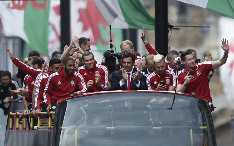 Fans greet Welsh team upon return home