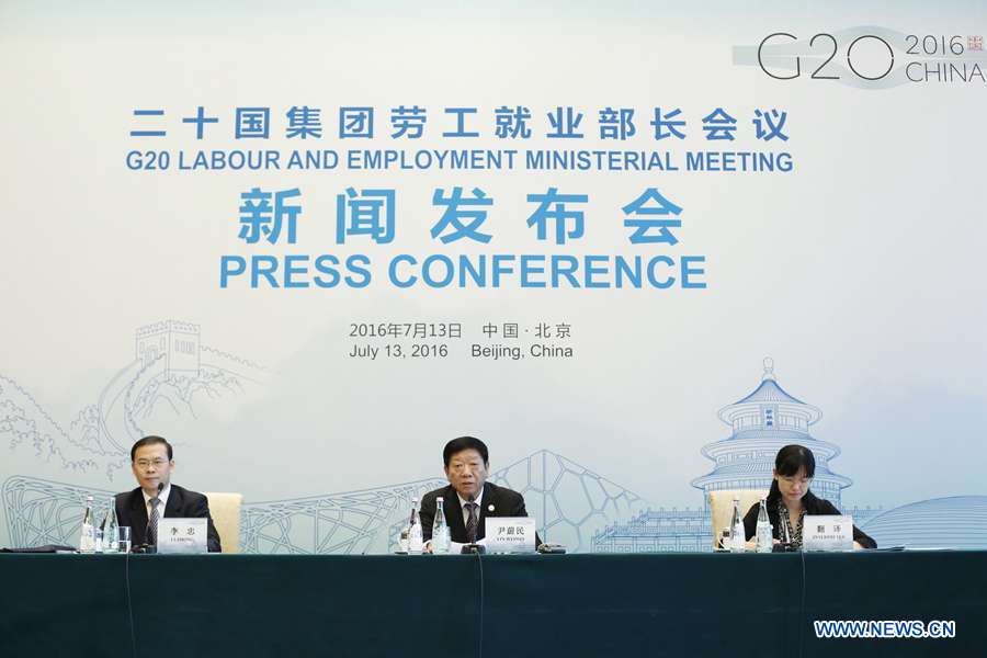 Chinese Minister of Human Resources and Social Security Yin Weimin (C) attends a press conference of the G20 Labor and Employment Ministerial Meeting in Beijing, capital of China, July 13, 2016. G20 labor and employment ministers have agreed to encourage young entrepreneurs following a meeting in China. (Xinhua/Shen Bohan) 