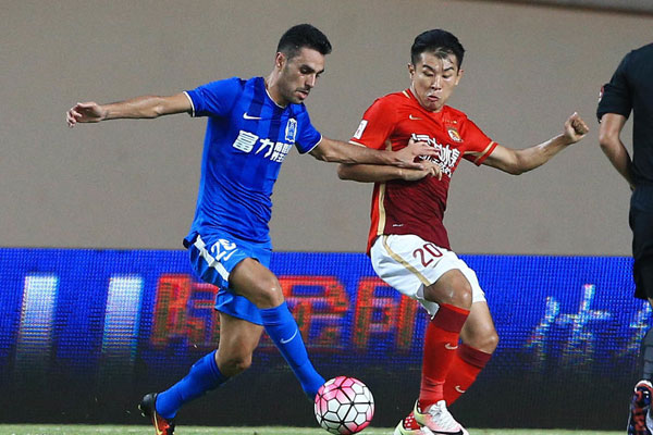 Guangzhou R&F beat leaders Guangzhou Evergrande 2-1