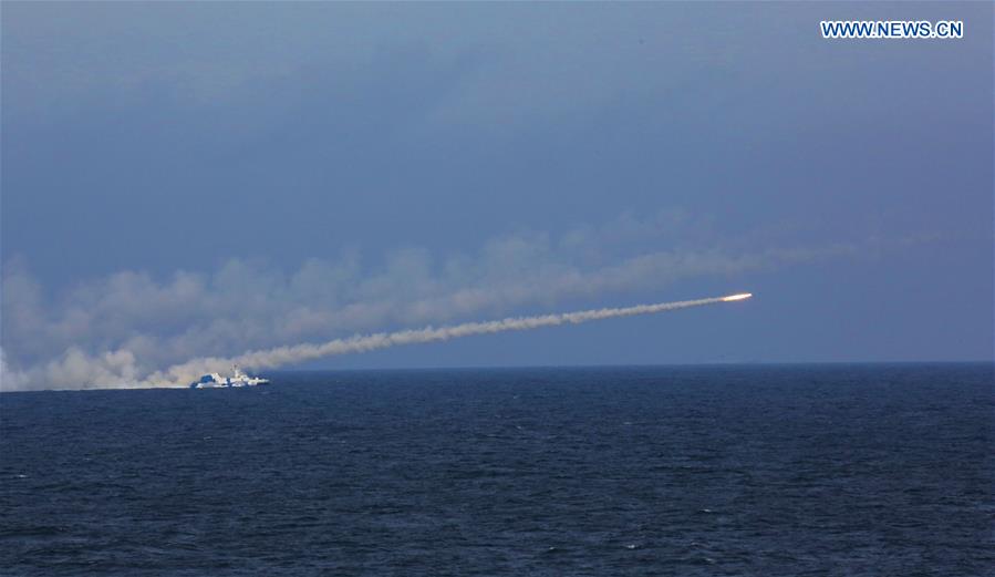 An anti-ship missile is launched during a drill in the East China Sea, Aug 1, 2016. The Chinese navy started a drill, which involved firing dozens of missiles and torpedoes, in the East China Sea Monday. The drill involved naval aviation forces, including submarines, ships and coastguard troops. (Xinhua/Wu Dengfeng)