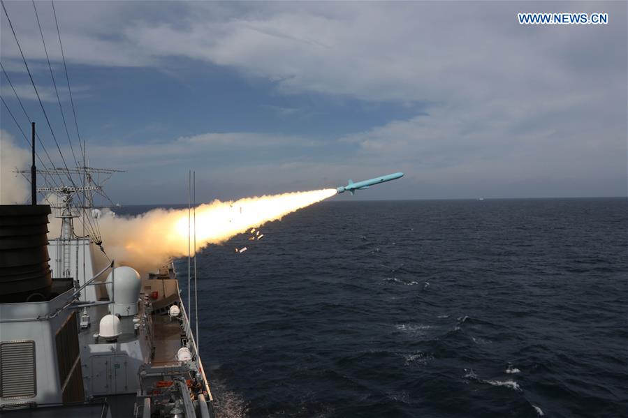 An anti-ship missile is launched during a drill in the East China Sea, Aug 1, 2016. The Chinese navy started a drill, which involved firing dozens of missiles and torpedoes, in the East China Sea Monday. The drill involved naval aviation forces, including submarines, ships and coastguard troops. (Xinhua/Wu Dengfeng)