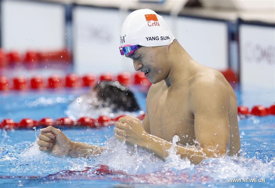 Sun Yang of China celebrates after the men