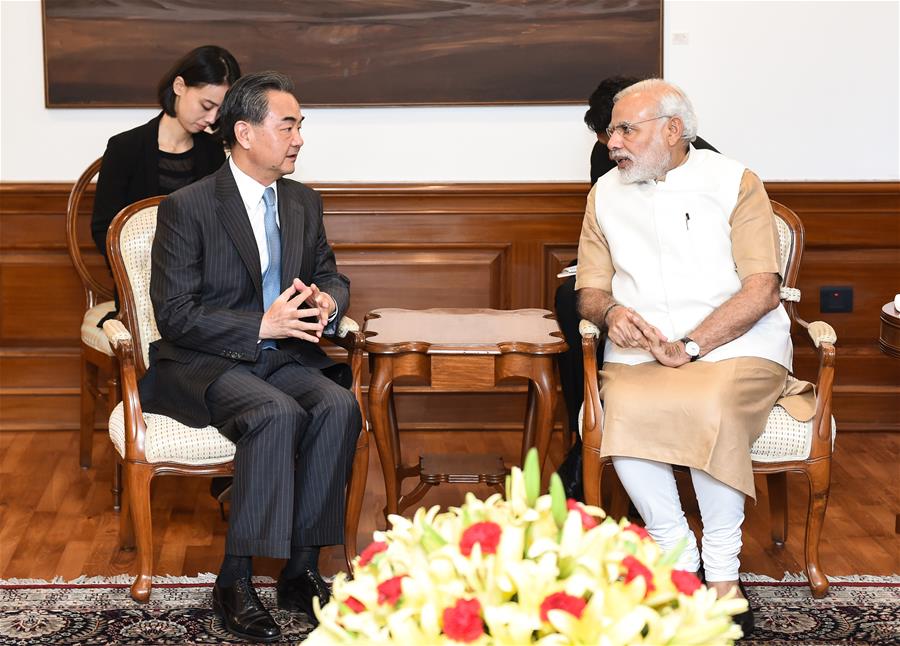 Indian Prime Minister Narendra Modi (R) meets with Chinese Foreign Minister Wang Yi in New Delhi, India, Aug. 13, 2016. (Xinhua/Bi Xiaoyang)