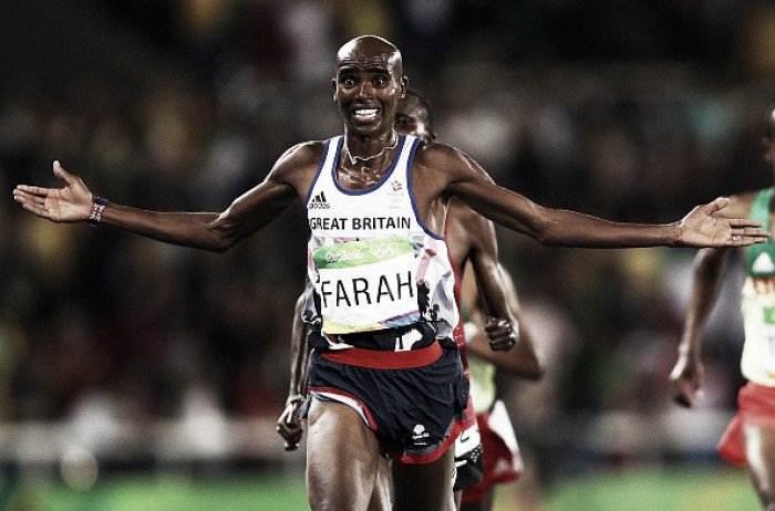 Defending champion overtakes Paul Kipngetich Tanui of Kenya