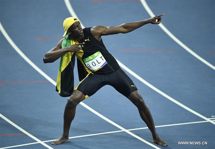 Usain Bolt of Jamaica celebrates after the final of men