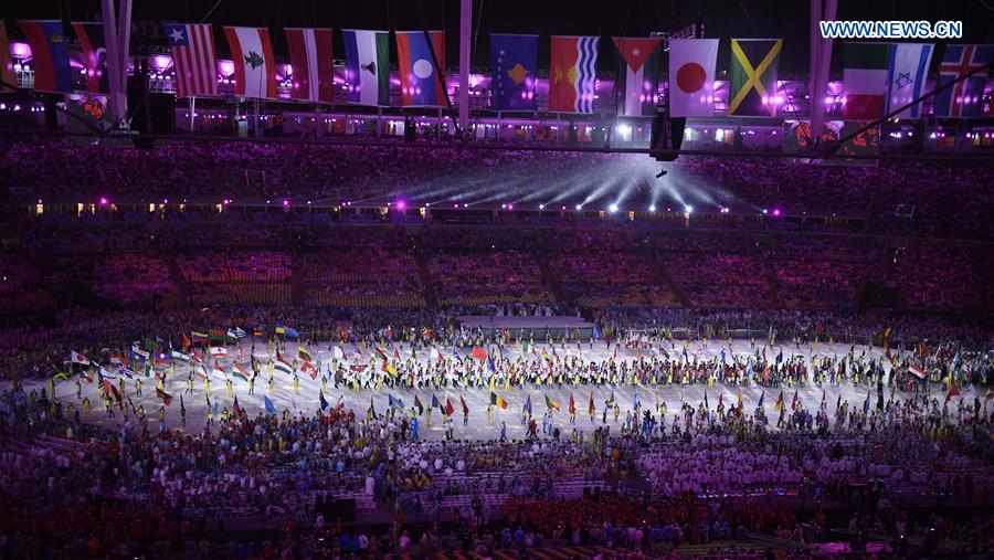 Athletes parade at the Maracana Stadium during the closing ceremony of the 2016 Rio Olympic Games in Rio de Janeiro, Brazil, Aug. 21, 2016. (Xinhua/Liu Jie)  