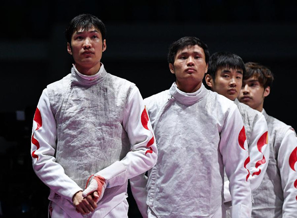 8月12日，中國隊選手雷聲、陳海威、馬劍飛和施嘉洛（從左至右）在比賽中出場