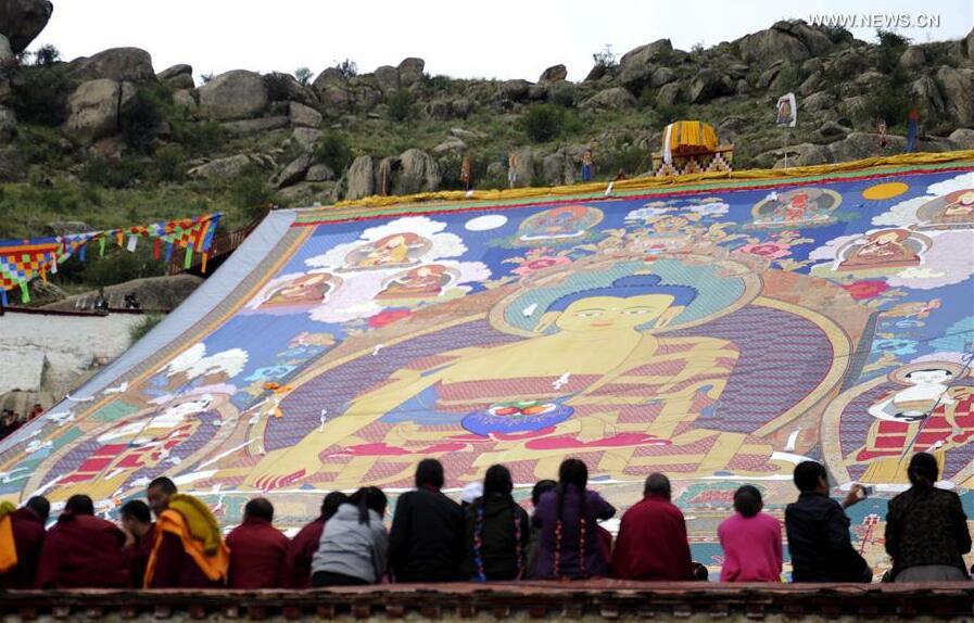 A huge Thangka Buddha portrait is exhibited at Drepung Monastery in Lhasa, capital of southwest China