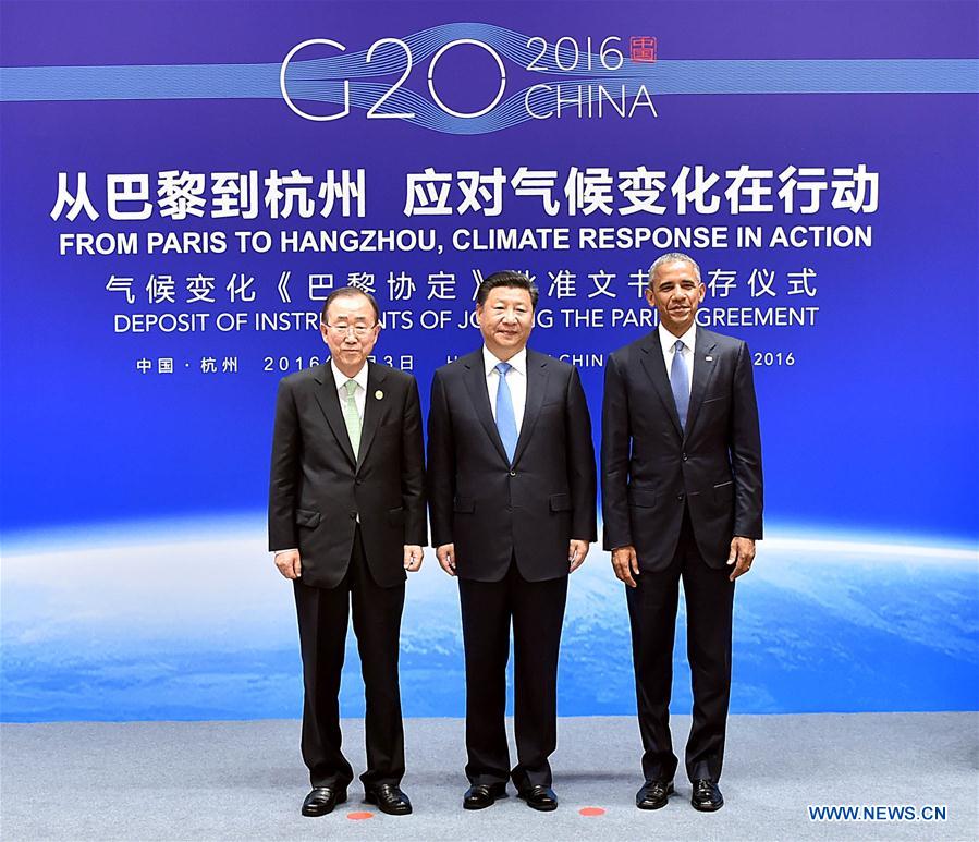 Chinese President Xi Jinping (C), U.S. President Barack Obama (R) and Secretary-General of the United Nations Ban Ki-moon attend the deposit of instruments of joining the Paris Agreement in Hangzhou, capital city of east China