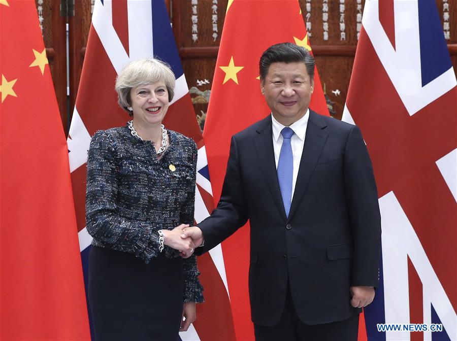 Chinese President Xi Jinping meets with British Prime Minister Theresa May, who is here to attend the Group of 20 (G20) summit, in Hangzhou, capital of east China