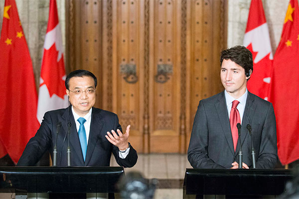 Premier Li Keqiang and Canadian Prime Minister Justin Trudeau met with journalists on Sept 22 in Ottawa, the capital city of Canada.