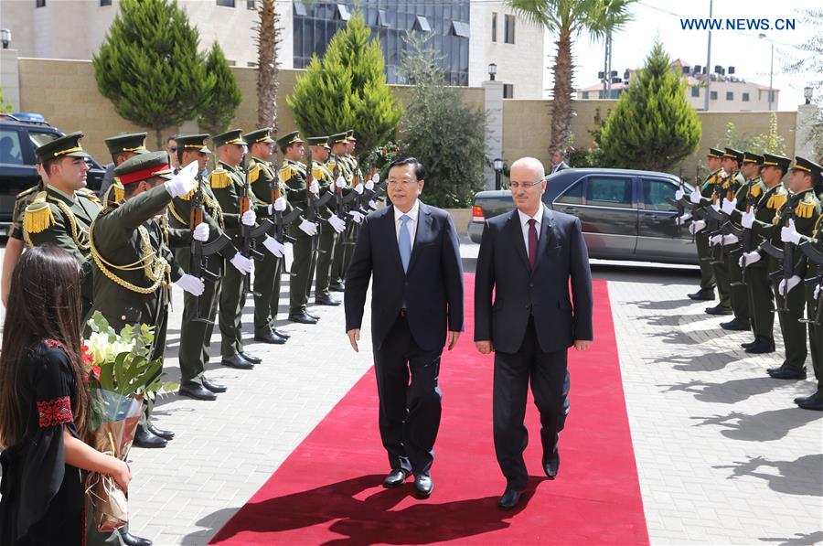 Zhang Dejiang (L), chairman of the Standing Committee of China