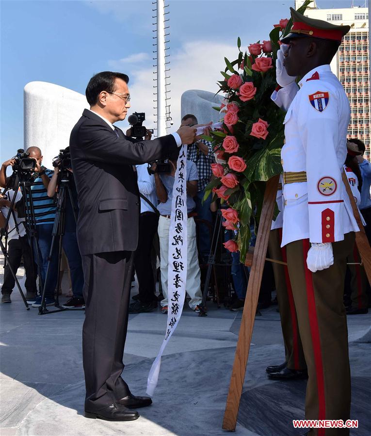 Chinese Premier Li Keqiang lays a wreath at the monument of Jose Julian Marti Perez and visited a local memorial hall in memory of the Cuban national hero in Havana on Sept. 24, 2016. Jose Julian Marti Perez, a great poet, national hero and thinker of Cuba, dedicated his short life to Cuba’s independence and freedom in Latin America. He participated in revolutionary activities against colonization when he was 15 years old and died on the battlefield fighting for Cuba’s independence at the age of 42. [Photo: Xinhua]