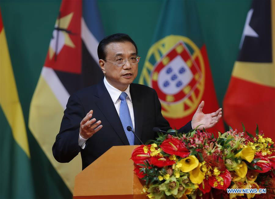 Premier Li Keqiang delivers a keynote speech at the opening ceremony of the 5th Ministerial Conference of the Forum for Economic and Trade Cooperation between China and Portuguese-speaking Countries in Macao, Oct. 11, 2016. [Photo: Xinhua/Ju Peng]