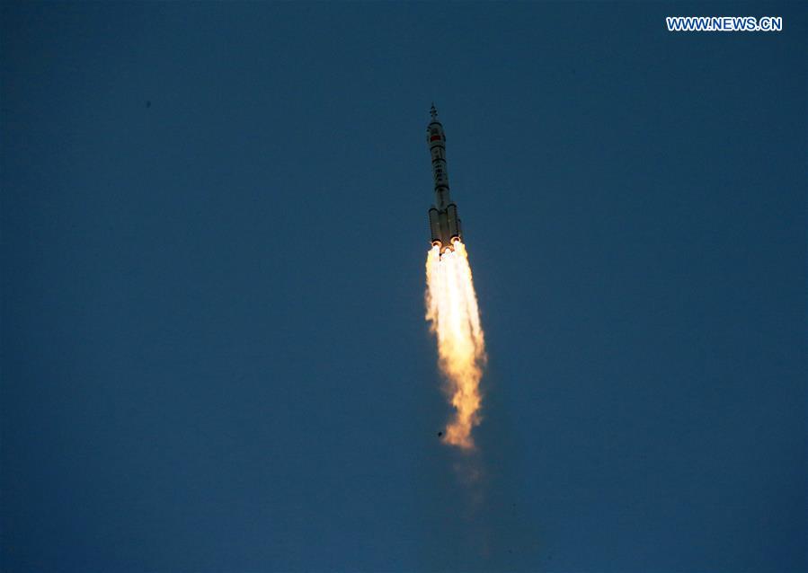 The Long March-2F carrier rocket carrying China