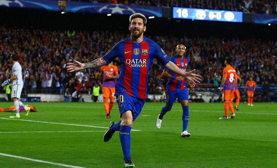 Lionel Messi wheels away in celebration after netting for Barcelona against Manchester City in the first half.