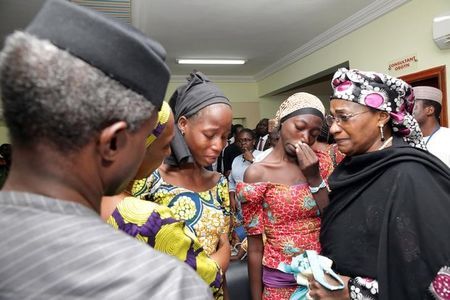 Some of the 21 Chibok school girls released are seen during a meeting with Nigeria