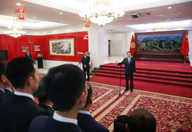 Chinese Premier Li Keqiang speaks at Chinese embassy in Kyrgyzstan at Bishkek, capital of Kyrgyzstan, on Wednesday, Dec. 2, 2016. Chinese Premier Li Keqiang arrived in Bishkek Wednesday for an official visit to Kyrgyzstan and the 15th prime ministers