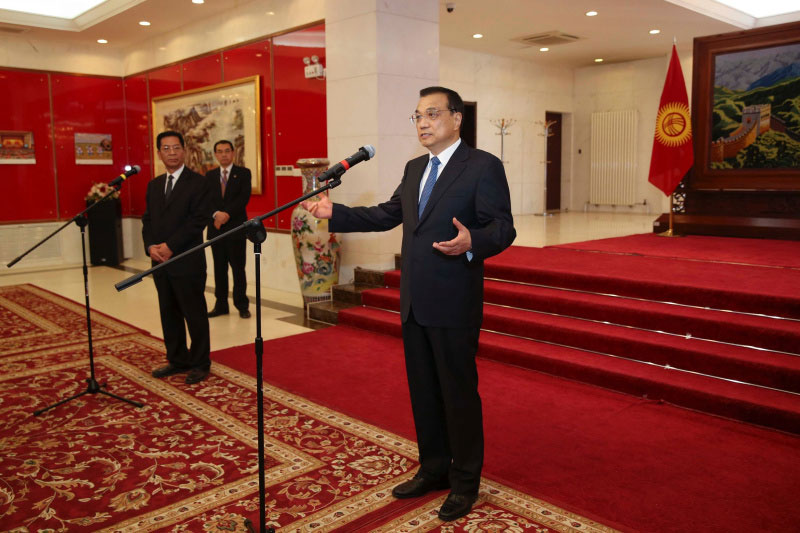 Chinese Premier Li Keqiang speaks at Chinese embassy in Kyrgyzstan at Bishkek, capital of Kyrgyzstan, on Wednesday, Dec. 2, 2016. Chinese Premier Li Keqiang arrived in Bishkek Wednesday for an official visit to Kyrgyzstan and the 15th prime ministers