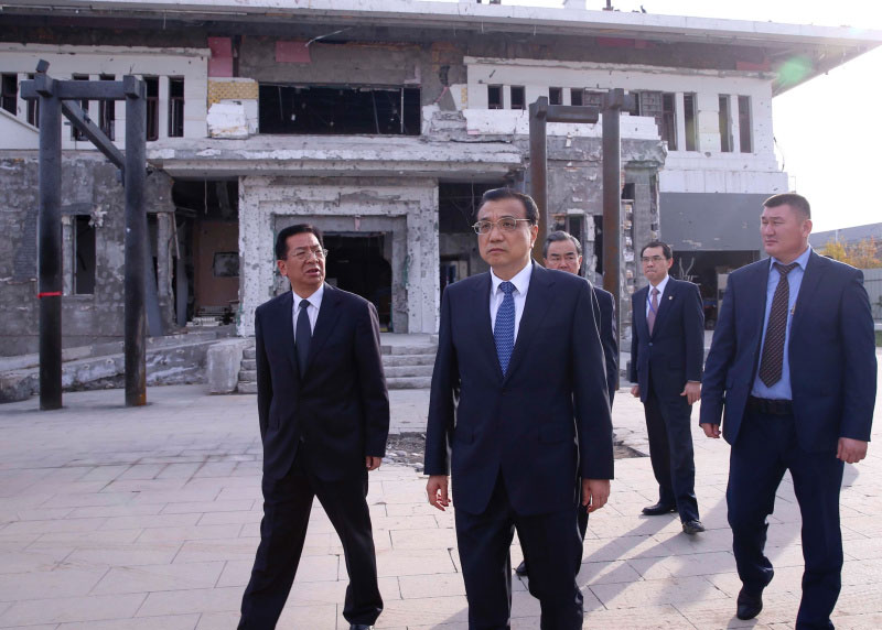 Chinese Premier Li Keqiang visits Chinese embassy in Kyrgyzstan at Bishkek, capital of Kyrgyzstan, on Wednesday, Dec. 2, 2016. Chinese Premier Li Keqiang arrived in Bishkek Wednesday for an official visit to Kyrgyzstan and the 15th prime ministers