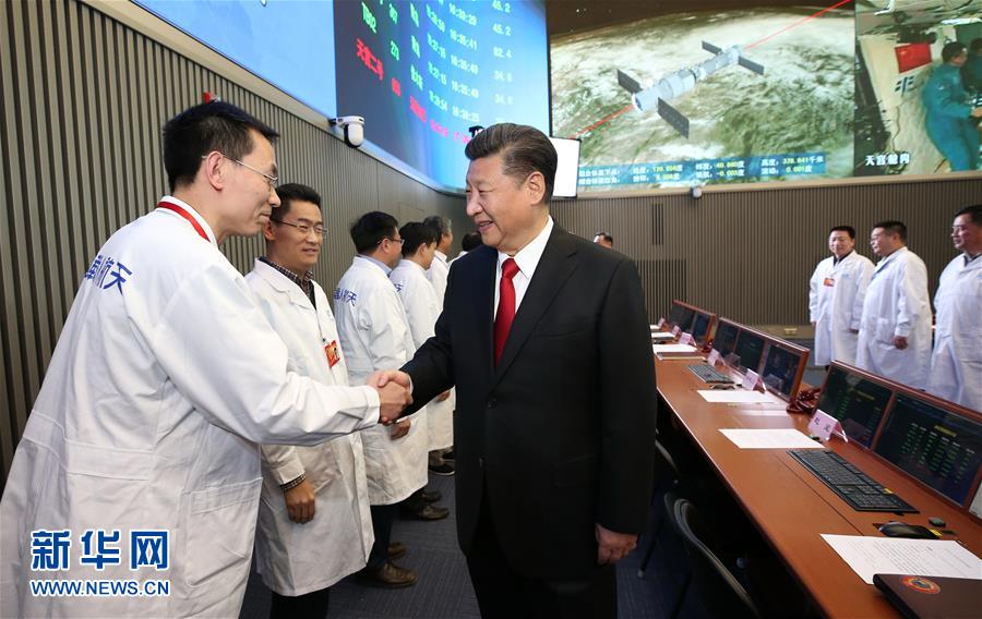 President Xi Jinping has talked with astronauts, Jing Haipeng and Chen Dong, who are currently in the Tiangong-2 space lab orbiting Earth.