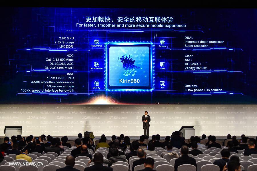 A representative of Huawei introduces Kirin 960 processor during a release ceremony of world leading internet scientific and technological achievements at the 3rd World Internet Conference in Wuzhen, east China