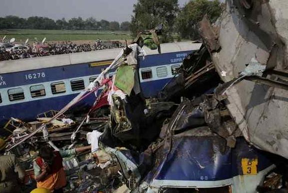 Rescuers work on the site of a train derailment accident in Kanpur Dehat, India, Sunday, Nov. 20, 2016. Many were killed Sunday when 14 coaches of an overnight passenger train rolled off the track in northern India, with rescue workers using cutting torches to try to pull out survivors, police said. AP Photo/Rajesh Kumar Singh 