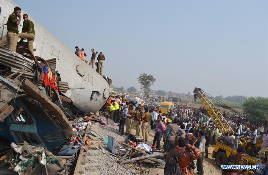 Rescue forces work at a train accident site near Kanpur in Uttar Pradesh, India, Nov. 20, 2016. In one of the worst railway tragedies in India in recent years, at least 91 people were killed and more than 150 others injured after an express train derailed in the northern state of Uttar Pradesh early Sunday morning. (Xinhua) 