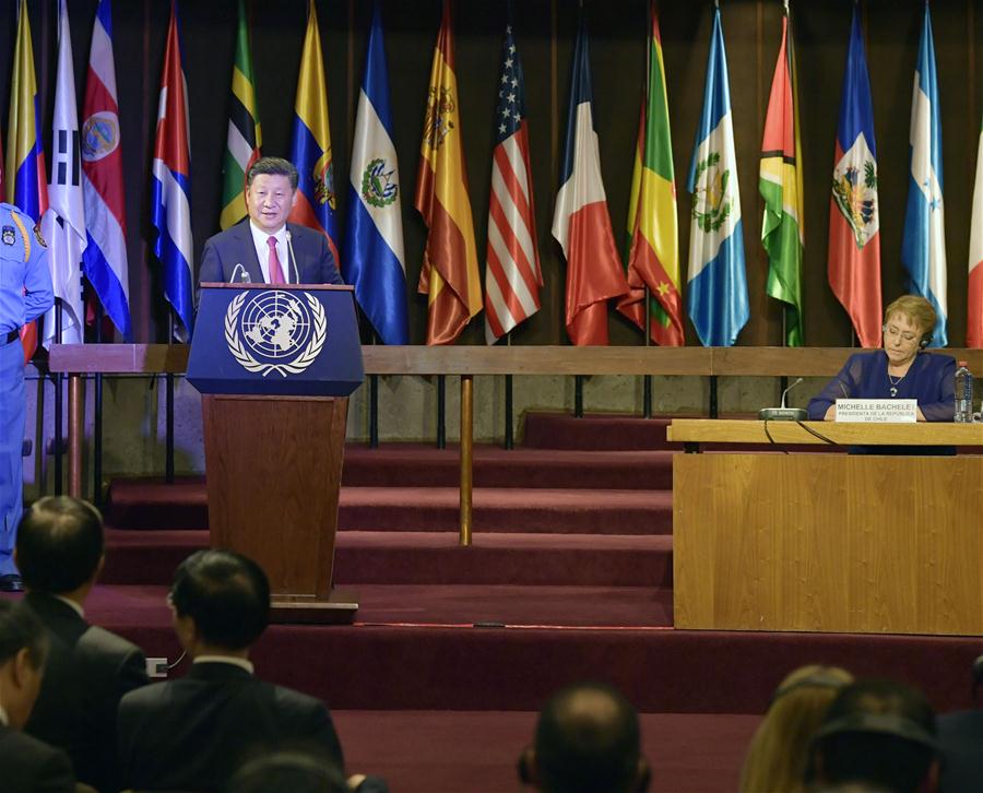 Chinese President Xi Jinping (L), accompanied by his Chilean counterpart Michelle Bachelet, delivers a speech at a summit of Chinese and Latin American media executives in Santiago, capital of Chile, Nov. 22, 2016. (Xinhua/Wang Ye)