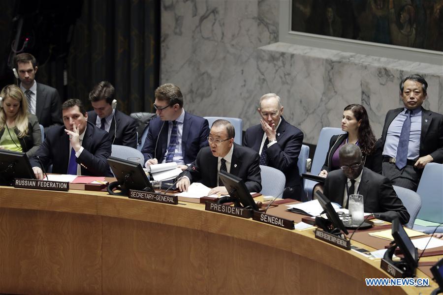 United Nations (UN) Secretary-General Ban Ki-moon (C, front) speaks after the UN Security Council adopted a resolution in response to DPRK