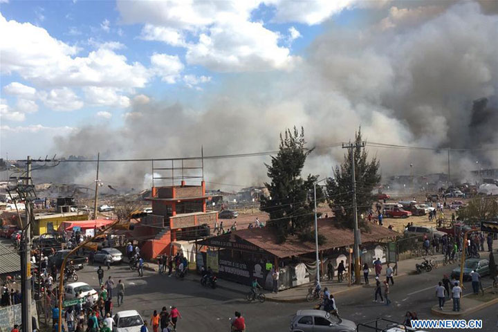 Photo taken by a mobile device on Dec. 20, 2016 shows the site of a blast at the San Pablito fireworks market in Tultepec, Mexico. At least 60 people were injured in an explosion Tuesday at the San Pablito fireworks market in Tultepec, a town in the State of Mexico, Luis Felipe Puente, director of Civil Protection, said. [Photo: Xinhua]