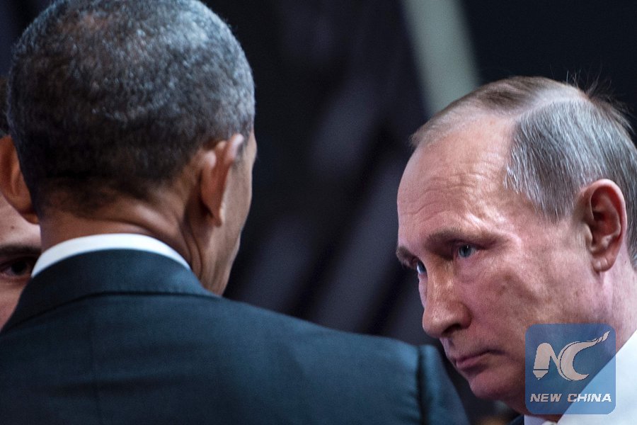 U.S. President Barack Obama (L) and Russia