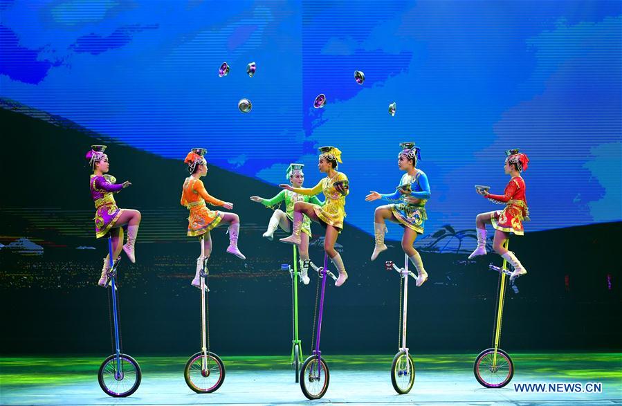 Acrobats perform during the closing ceremony of the 3rd Chinese acrobatics art festival in Luoyang, central China