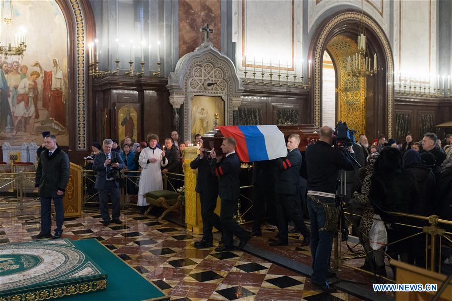 Pallbearers carry the casket of slain Russian Ambassador to Turkey Andrei Karlov during the funeral ceremony at the Christ the Saviour Cathedral in Moscow, Russia, Thursday, Dec. 22, 2016. Karlov was shot dead by a Turkish policeman Monday in Ankara, Turkey.(Xinhua/Bai Xueqi)