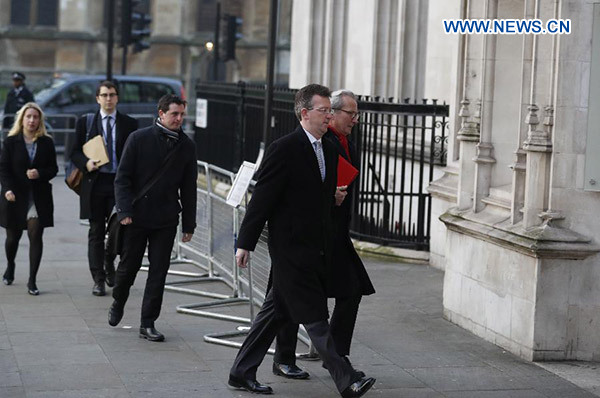 Attorney GeneralJeremy Wright (2nd R) arrives at the British Supreme Court inLondon, Britain, Jan. 24, 2017. The British Supreme Court onTuesday ruled on that Prime Minister Theresa May must consultParliament before triggering formal negotiations on Britain leavingthe European Union. (Xinhua/Han Yan)