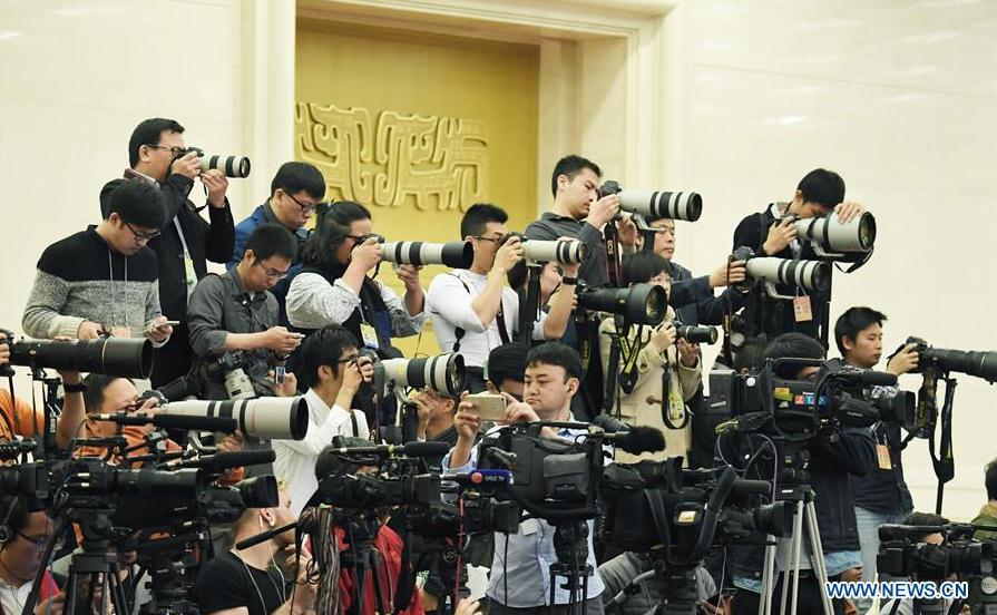 Journalists work at a press conference by Chinese Premier Li Keqiang at the Great Hall of the People in Beijing, capital of China, March 15, 2017. (Xinhua/Zhao Yingquan)