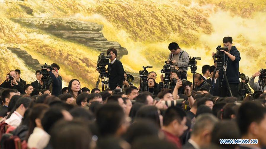 Journalists work at a press conference by Chinese Premier Li Keqiang at the Great Hall of the People in Beijing, capital of China, March 15, 2017. (Xinhua/Xue Yubin)