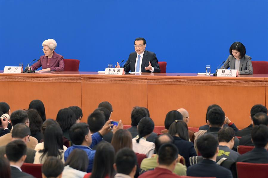 Chinese Premier Li Keqiang gives a press conference at the Great Hall of the People in Beijing, capital of China, March 15, 2017. (Xinhua/Xue Yubin)