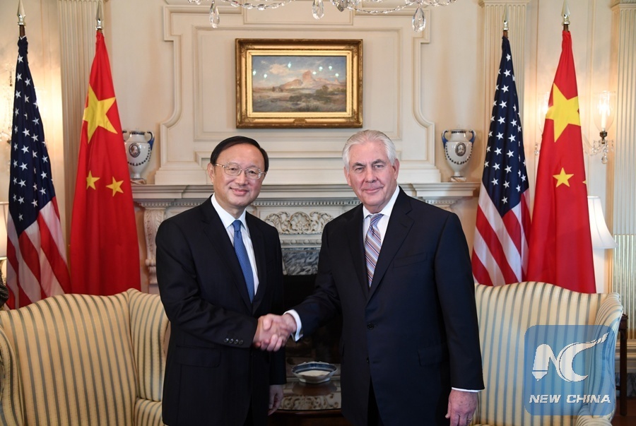 Chinese State Councilor Yang Jiechi (L) shakes hands with U.S. Secretary of State Rex Tillerson during their meeting in Washington D.C., the United States, on Feb. 28, 2017. (Xinhua/Yin Bogu)