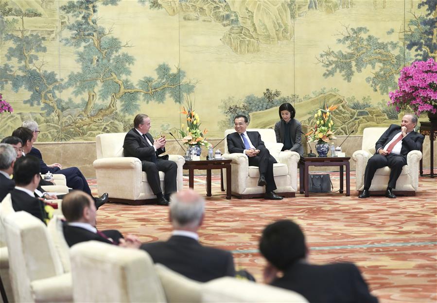 Chinese Premier Li Keqiang meets with foreign representatives of the China Development Forum (CDF) 2017 in Beijing, capital of China, March 20, 2017. (Xinhua/Pang Xinglei)