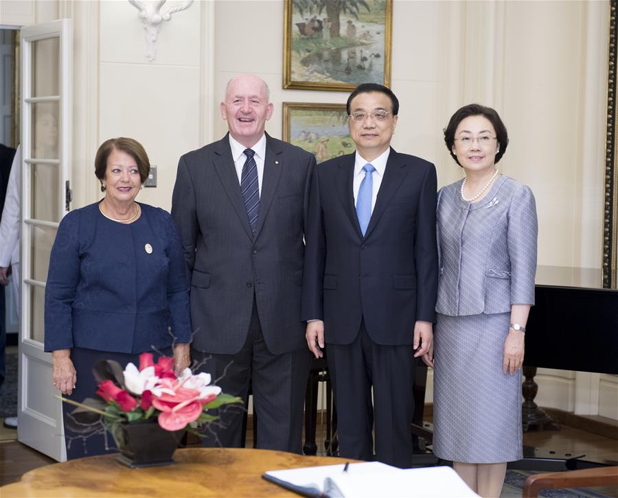 Chinese Premier Li Keqiang(2nd R) meets with Australian Governor-General Peter Cosgrove(2nd L) in Canberra, Australia, March 23, 2017. Li